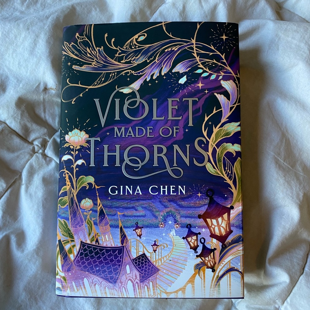 Owlcrate version of Violet Made of Thorns by Gina Chen